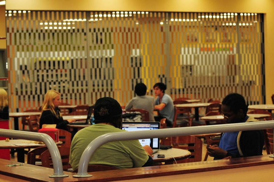 Students relax and hang out with friends in front of the closed food court at 4 p.m. on Tuesday.