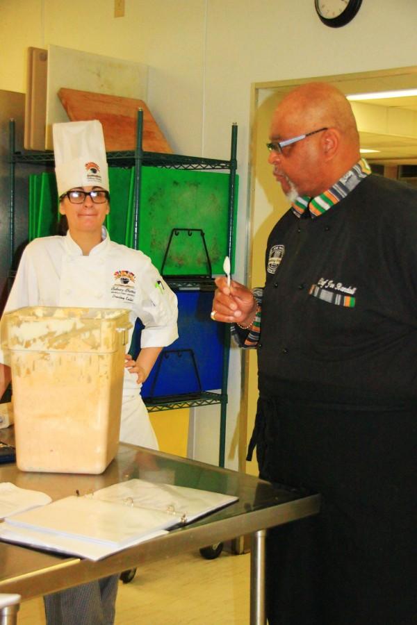 Chef Joe Randall critiques the culinary students’ sauce in preparation for Bite of the Arts on Tuesday in Gouaux Hall.