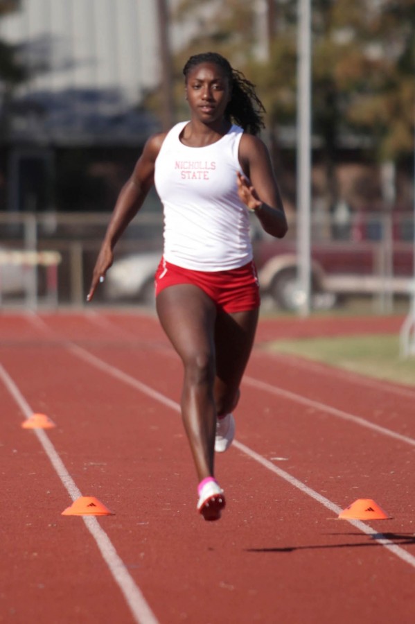 Sophomore runner Barlitra Dirance from Napoleonville runs in the 4x100 m relay.