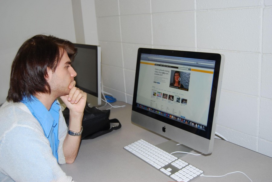 Dalton Primeaux, mass communication student from New Orleans, browses the Lynda Web site in the mass communication lab to further his studies in technology for his classes. Many mass communication majors and many other majors are required to use lynda.com for their classes.