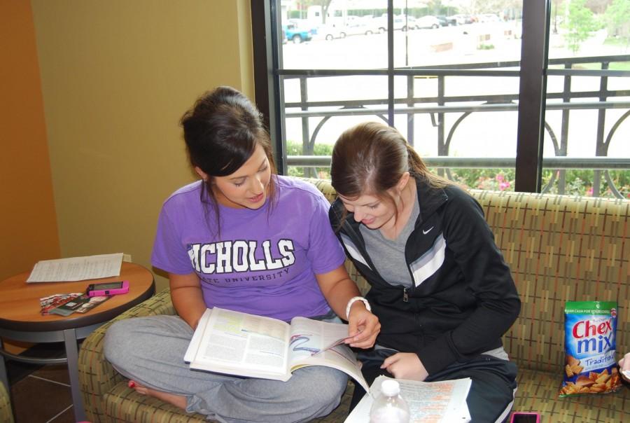 Marcy Roussel, nursing junior from Lutcher, and Jayme Hymel, nursing junior from Paulina, study for their class in Jazzman’s Monday.