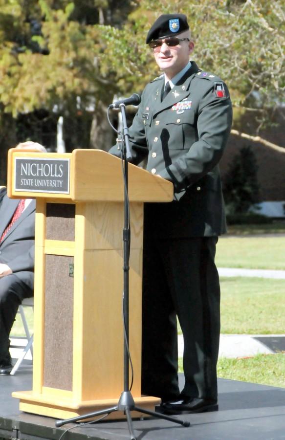 U.S. Army Major Mark Bolton speaks about a soldier’s sacrifices during the Veteran’s Day ceremony Nov. 11, 2011 in the quadrangle.m