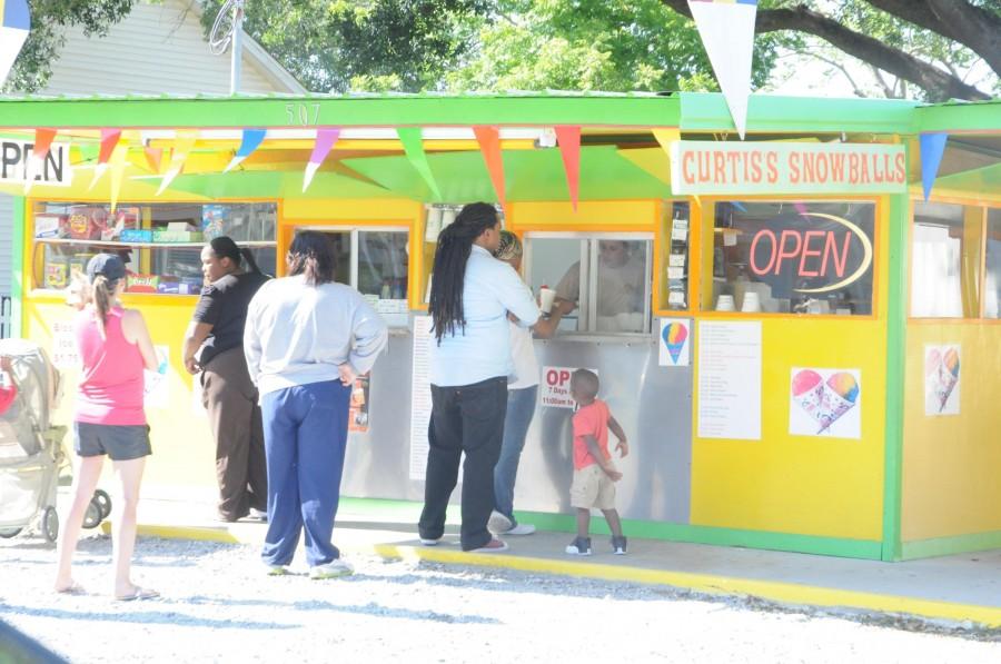 Customers wait in line at Curtiss Snowball Stand to quench their thirst.