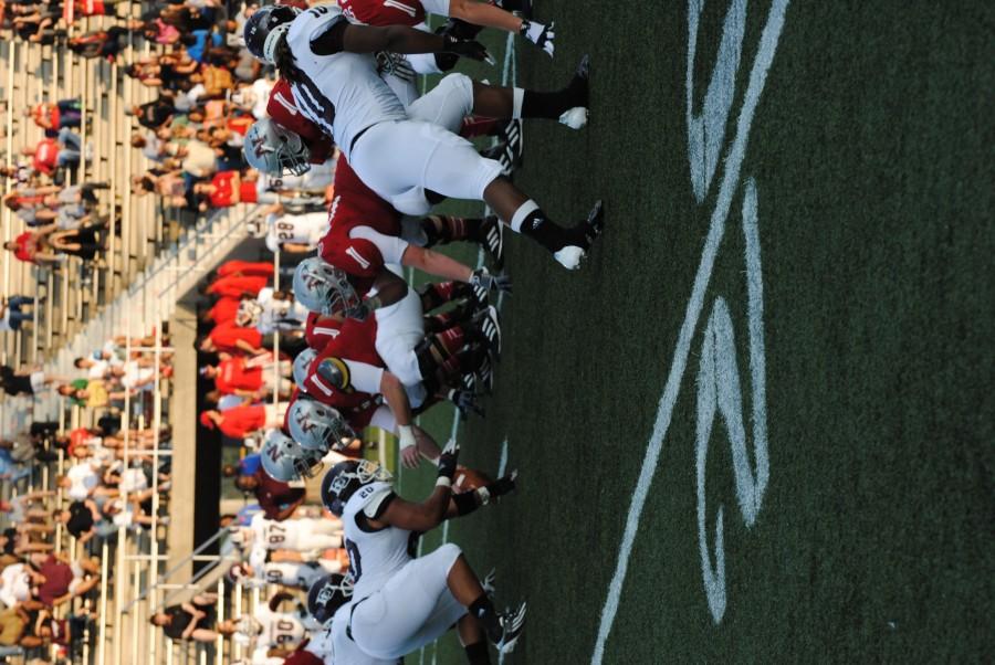 The+Colonels+offensive+line+preparing+for+another+play+against+Evangel+University+on+Saturday+night.