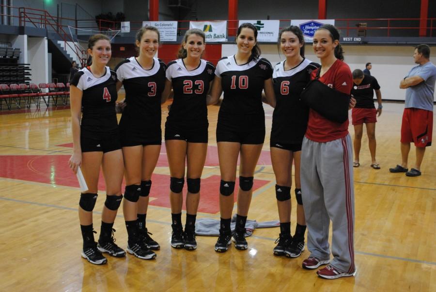 Volleyball+seniors+Nancy+Taylor%2C+Kathryn+Stock%2C+Jennifer+Brandt%2C+Sarah+Terry%2C+Jessica+Addicks%2C+and+Amanda+Newlin+gather+together+after+their+game+against+the+University+of+Central+Arkansas+on+Oct.+18.