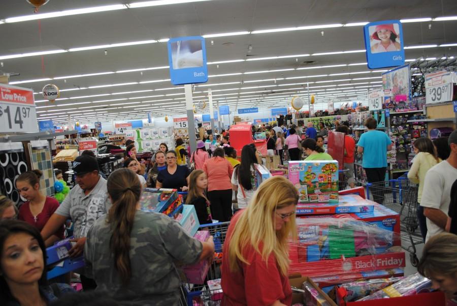 Crowds pack into Wal-Mart for Black Friday sales on Nov. 23.