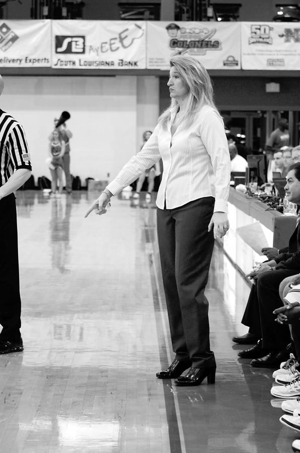 Women’s basketball head coach DoBee Plaisance signals to players at the Jan. 24 game.