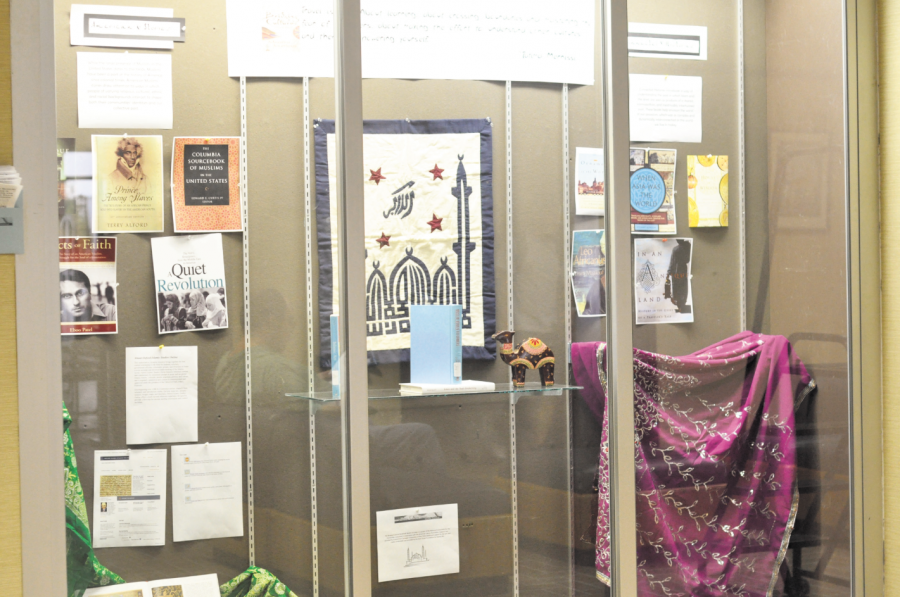 The display on the first floor of Ellender Library showcases the collection of books and films that are featured in the “Bridging Cultures Bookshelf
