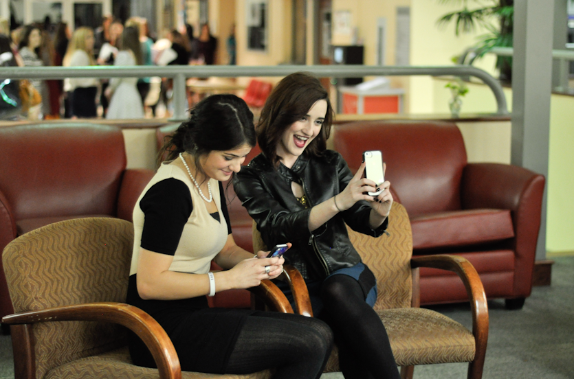 Freshmen Hannah Onnebane and Angelle Gaspard take “selfies” in the Student Union before their sorority meeting.