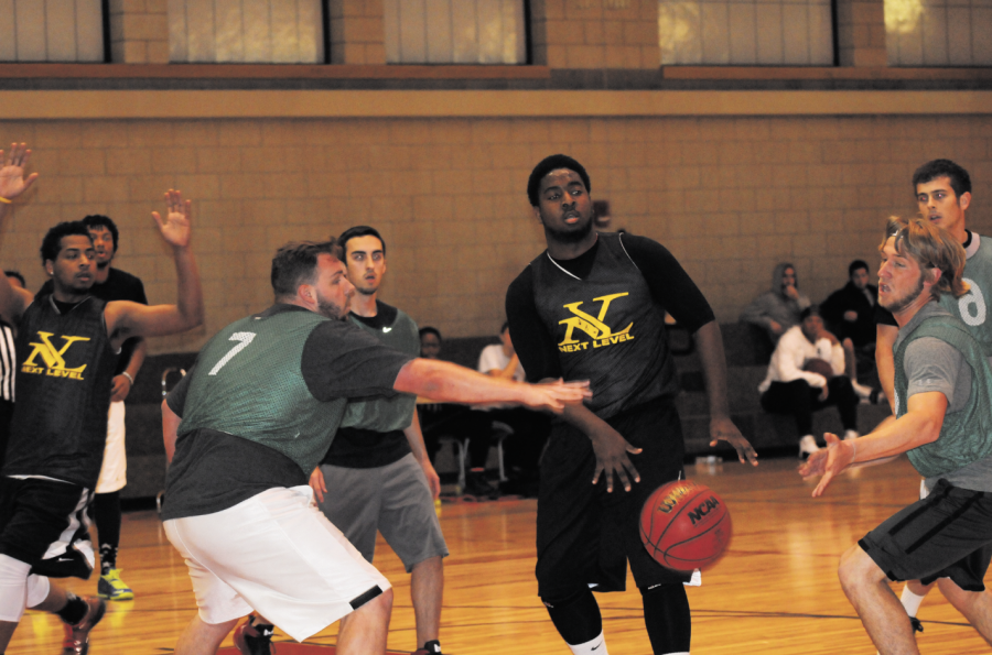 Students play basketball during intramural competitions held in the Harold J. Callais Recreation Center.