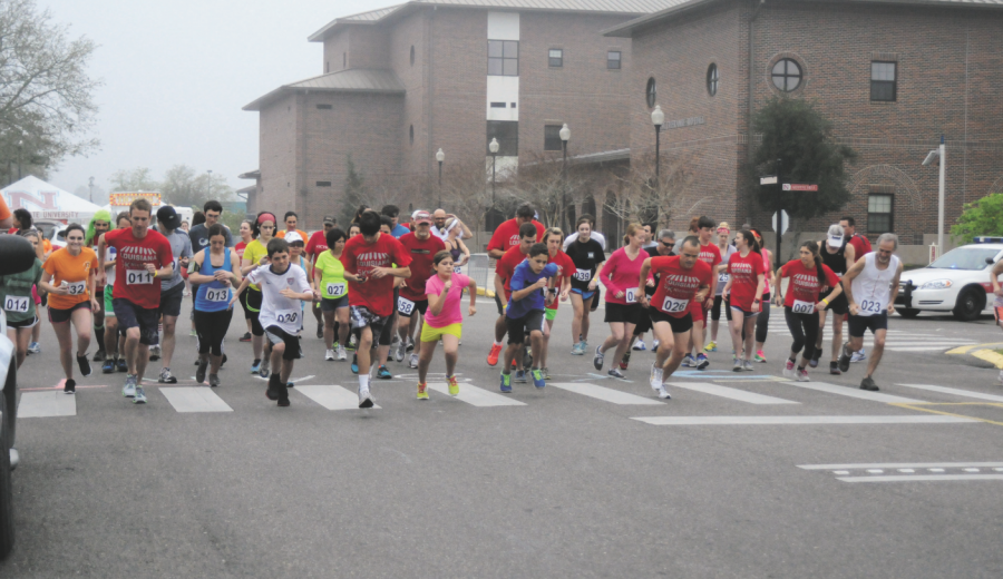 Runners take off for the 5K run as part of last year’s 5th annual Swamp Stomp festival.