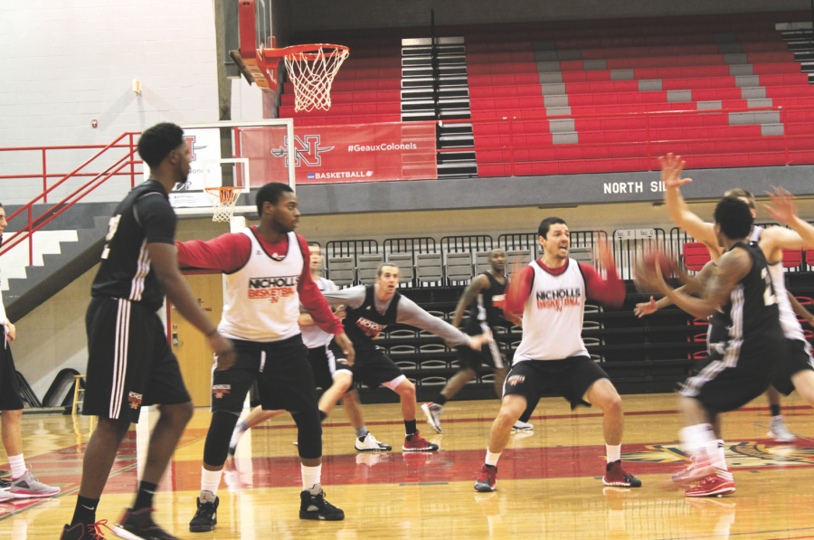 The Nicholls State University men’s basketball team practices in Stopher Gymnasium.