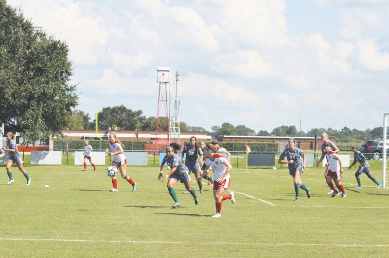Nicholls defender Amber Moore and Texas A&M-Corpus Christi midfielder Yvette Franco chase the ball during the Colonels game against the Islanders on Sept. 21.