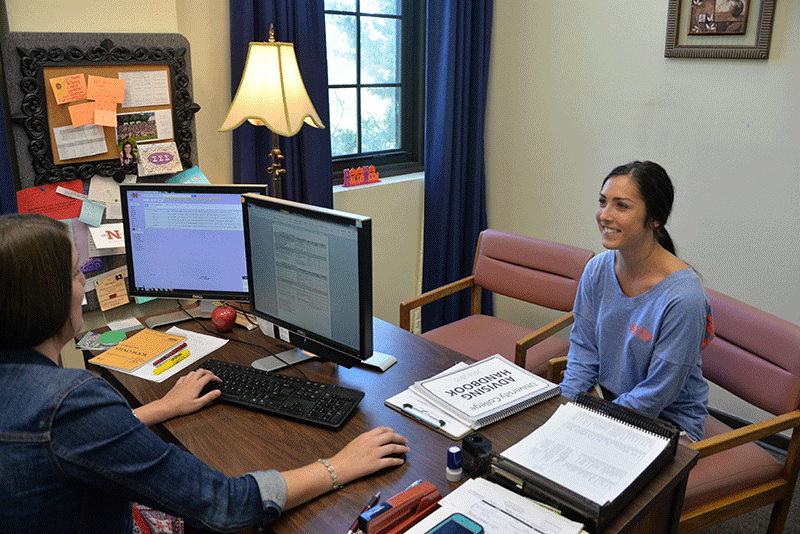 Kristen Waguespack, sophmore dietetics major from Thibadaux, meets with advisor Cambria Bouzigard Wednesday morning.