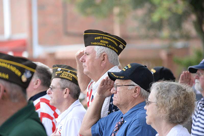 Veterans+stand+to+be+recognized+at+Nicholls+annual+Veterans+Day+ceremony+in+the+quad+Wednesday%2C+November+11th.