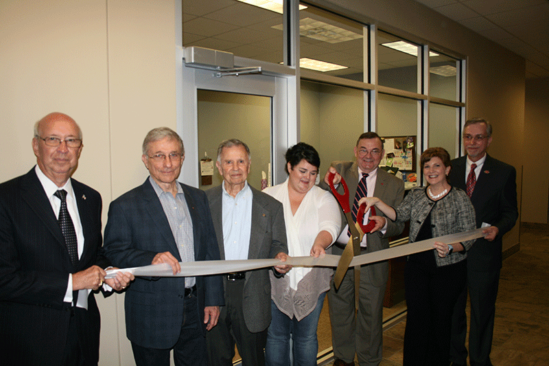 Dr. Murphy and Fletcher representatives participate in ribbon cutting ceremony, Monday at the Schriever Fletcher Community College campus.