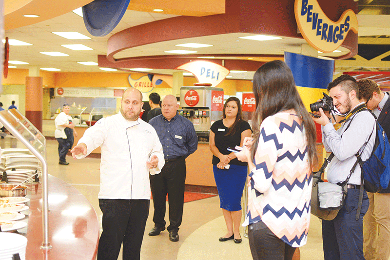 Norman Hunt, Sodexo Executive Chef, shows reporters the new vegan nosh bar located in Galliano Dining Hall Wednesday morning.
