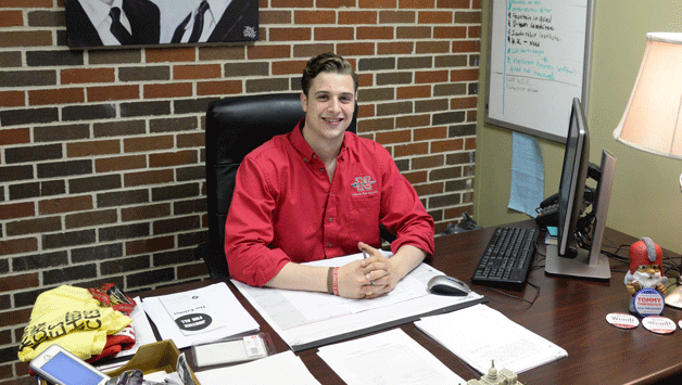 SGA Vice President Austin Wendt smiles in his office after being re-elected for a second term yesterday. 