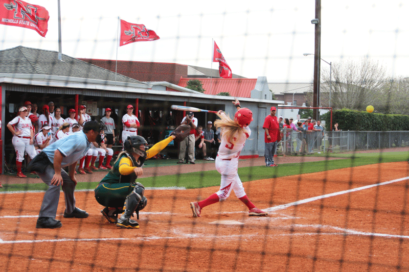 Amanda Gianelloni, #5 shortstop, hits the ball, bringing in the first run of the game against Southeastern University on Friday, March 24. 