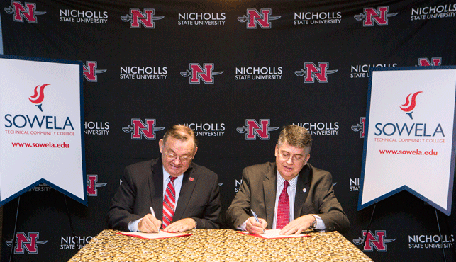 Nicholls President Bruce Murphy and SOWELA Chancellor Neil Aspinwall at work during a joint signing held in the President’s Dining Room in the Lanny D. Ledet Culinary Arts Building.