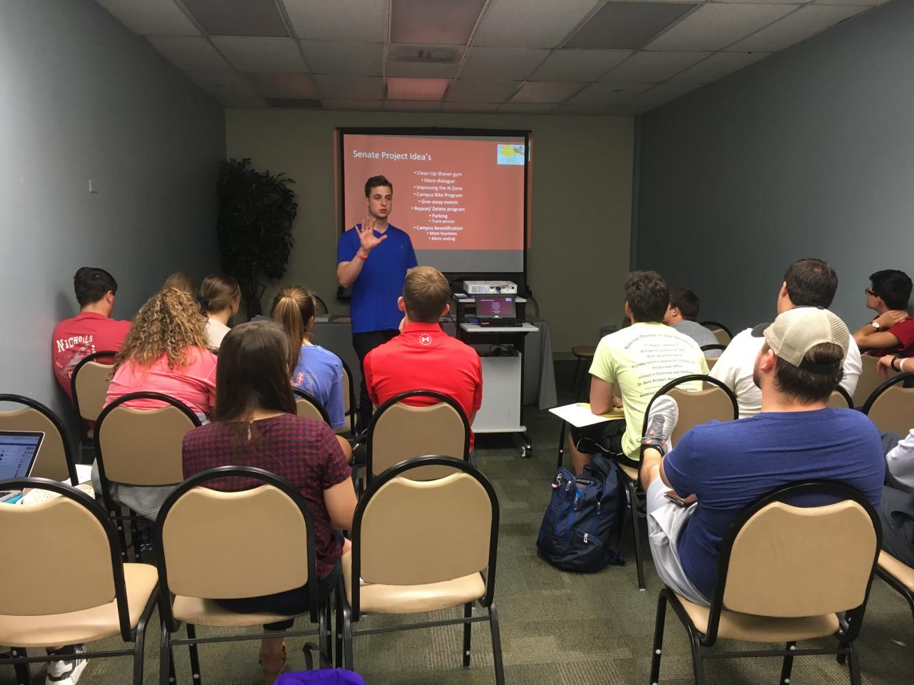 SGA Vice President Austin Wendt presents the results of the organization's survey.