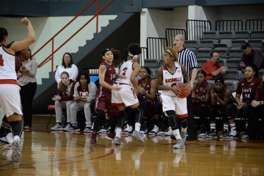 Emani White #0 a senior from New Orleans runs with the ball during the Troy Vs. Nicholls basketball game that took place on December 14, 2016 in Stopher Gym.