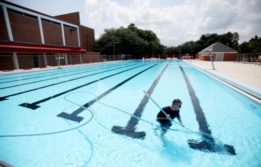 Michael Matherne cleans Ayo Pool in preparation for the pools opening, Monday, July 11th, 2011.

The pool has been closed due to renovations.


(Photo by Misty Leigh McElroy/Nicholls State University)
7/7/11