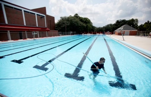 Michael Matherne cleans Ayo Pool in preparation for the pool's opening, Monday, July 11th, 2011.

The pool has been closed due to renovations.


(Photo by Misty Leigh McElroy/Nicholls State University)
7/7/11