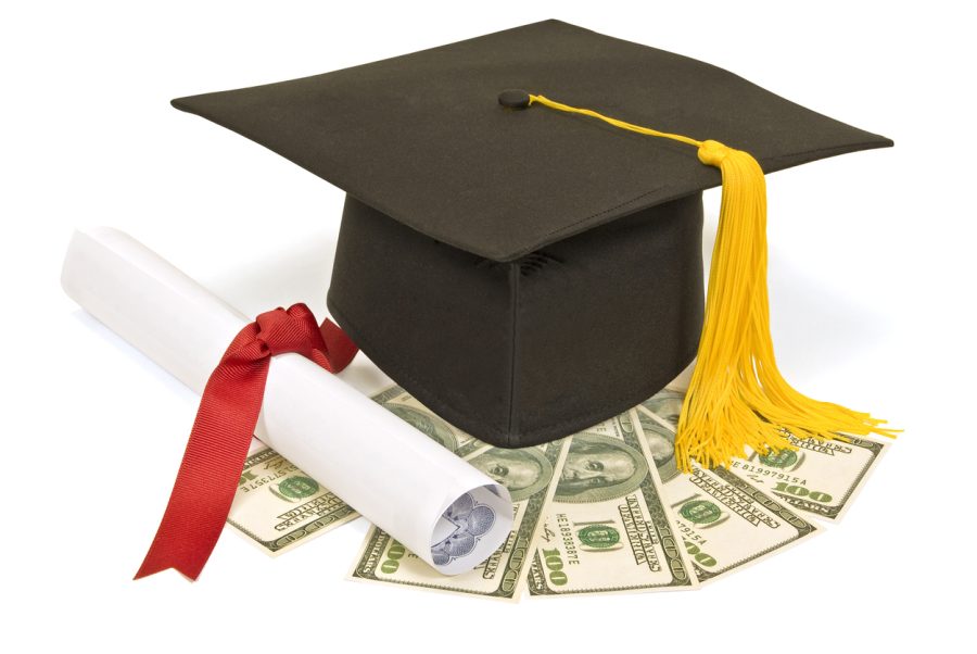 Mortar board, diploma and money.  Ideal concept shot for value of education or cost of education.  Isolated on white.