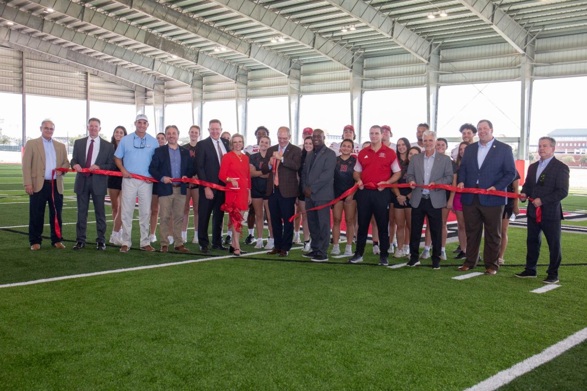 Gov. Edwards cutting the ribbon at the opening of the Nicholls Athletics Covered Practice Facility (11/7)