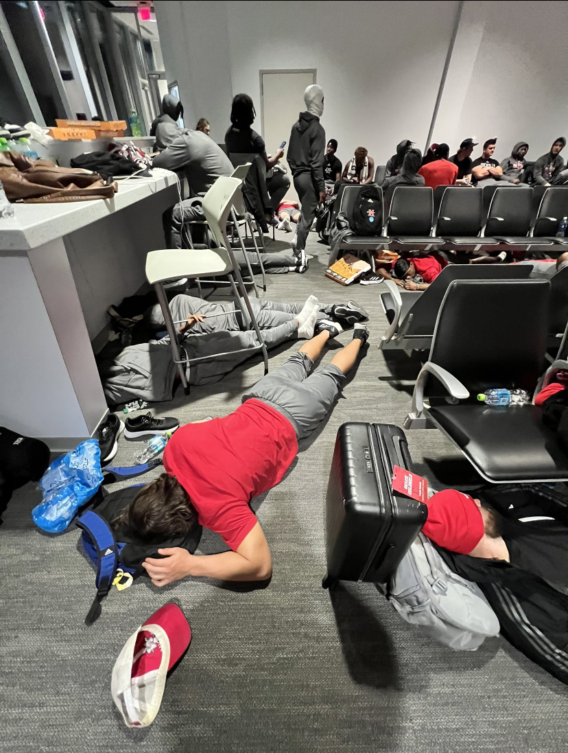 Nicholls football players waiting in the airport