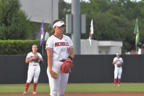 Audrey McNeill (#14) stares down a batter a she prepares to pitch in a game vs Texas A&M - Corpus Christi
