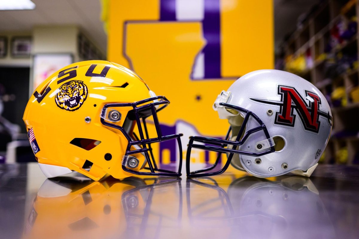 An LSU and Nicholls helmet facing each other