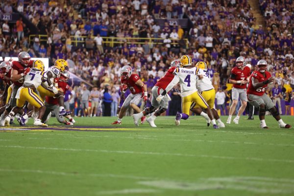 Nicholls running back Collin Guggenheim cutting through a hole against LUS 9/7/2024