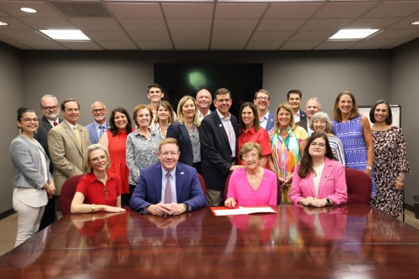 Nicholls President Dr. Jay Clune signing into effect the creation of the Wm. Clifford Engineering  School