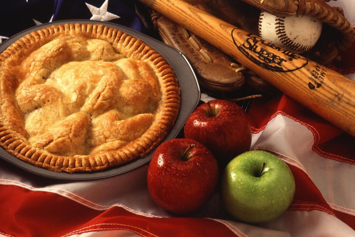 A fall pie with apples surrounding