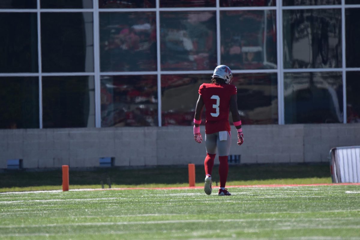 Lawrence Sullivan Jr. stands in the backfield ahead of defending a play