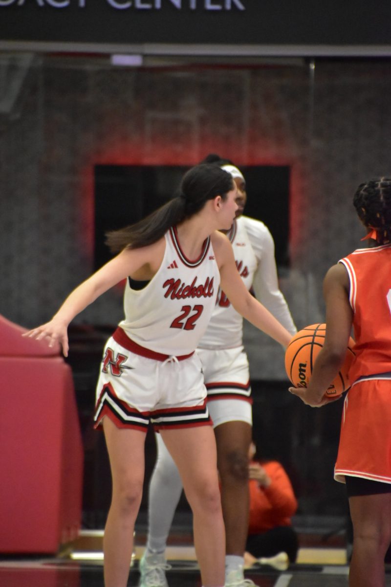 Nicholls State University guard Deonna Brister guides teammates on a defensive possession as she guards a University of Texas-Rio Grande Valley ball handler