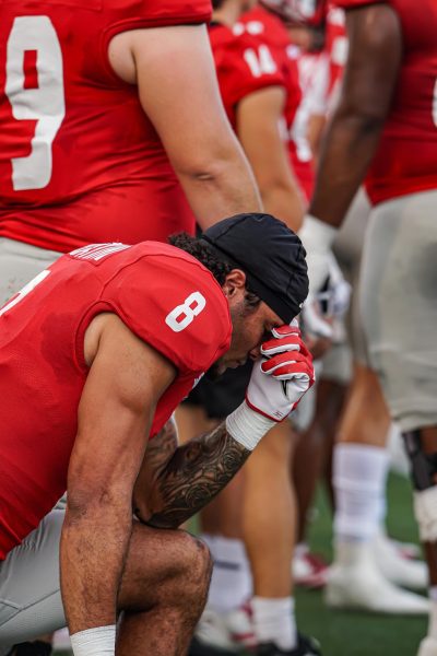 Elijah Sabbatini takes a knee.