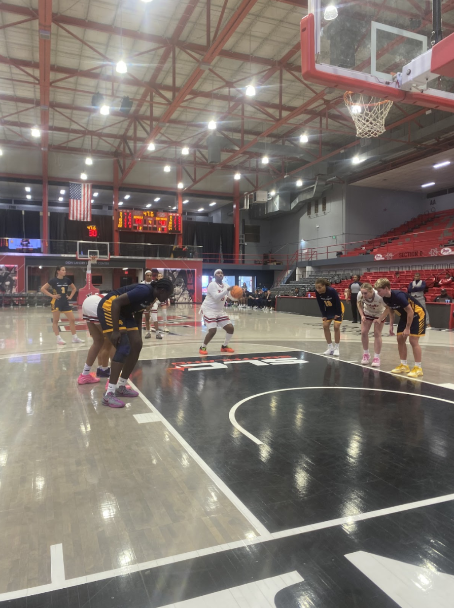 Jasmine Matthews attempts Free throw. 