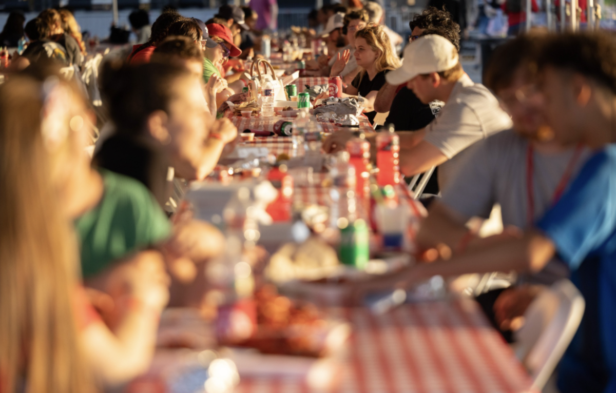 Students enjoy plates of crawfish at Nicholls' 2025 Crawfish Day. (Photo via: Nicholls State University Facebook).
